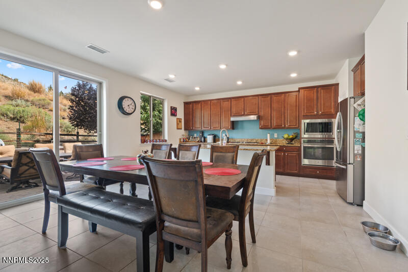 1590 Scott Valley Road Reno, NV 89523 - Photo 8 of 29 a view of a dining room with furniture window and outside view