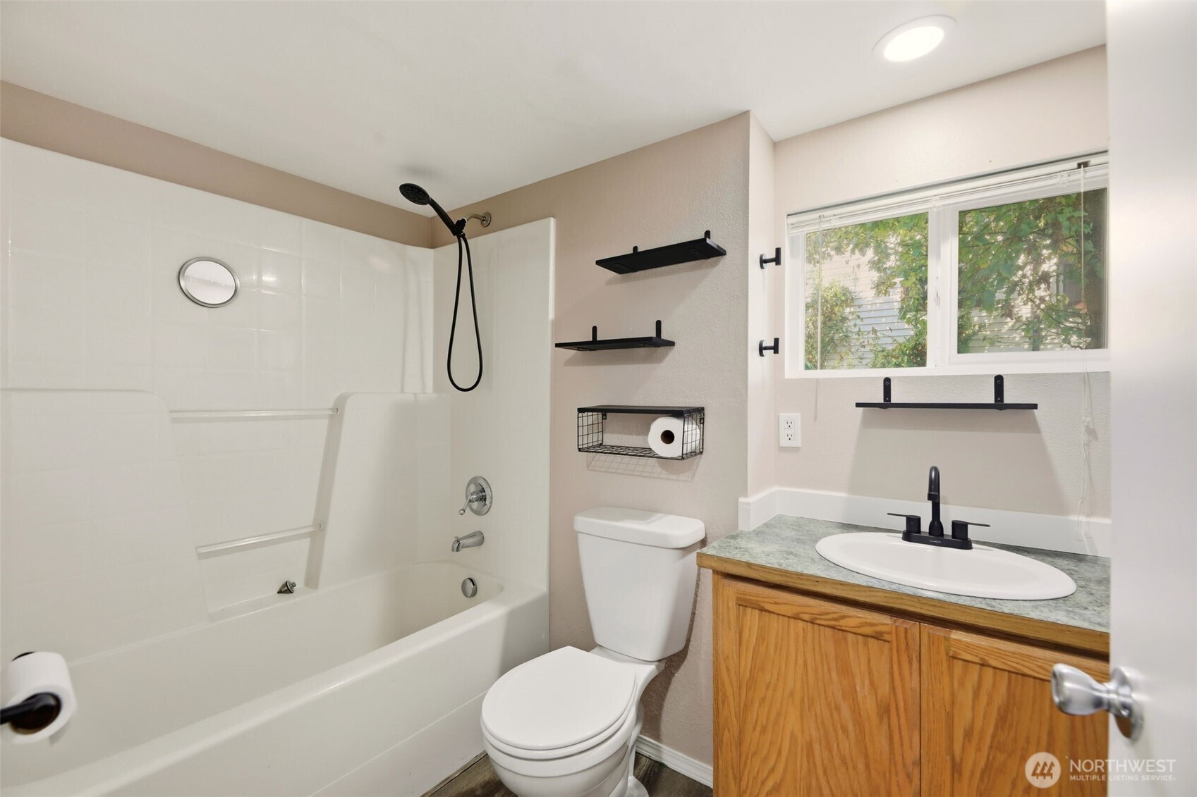 1726 Baker Avenue Everett, WA 98201 - Photo 27 of 39 a bathroom with a sink toilet and shower