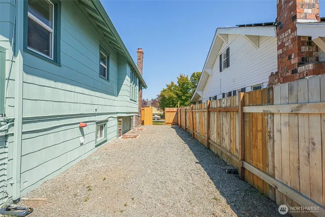 a front view of house with an outdoor space