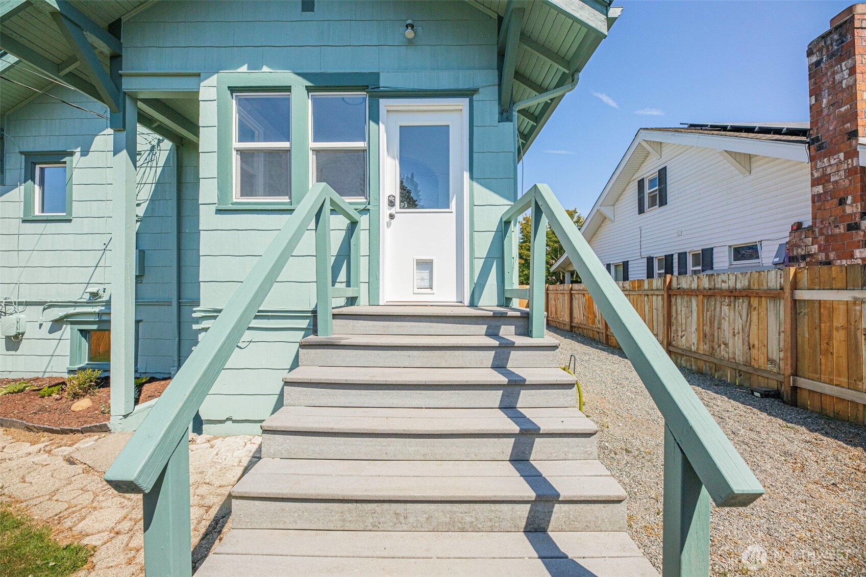 1726 Baker Avenue Everett, WA 98201 - Photo 38 of 39 a view of entryway with wooden floor and a front door