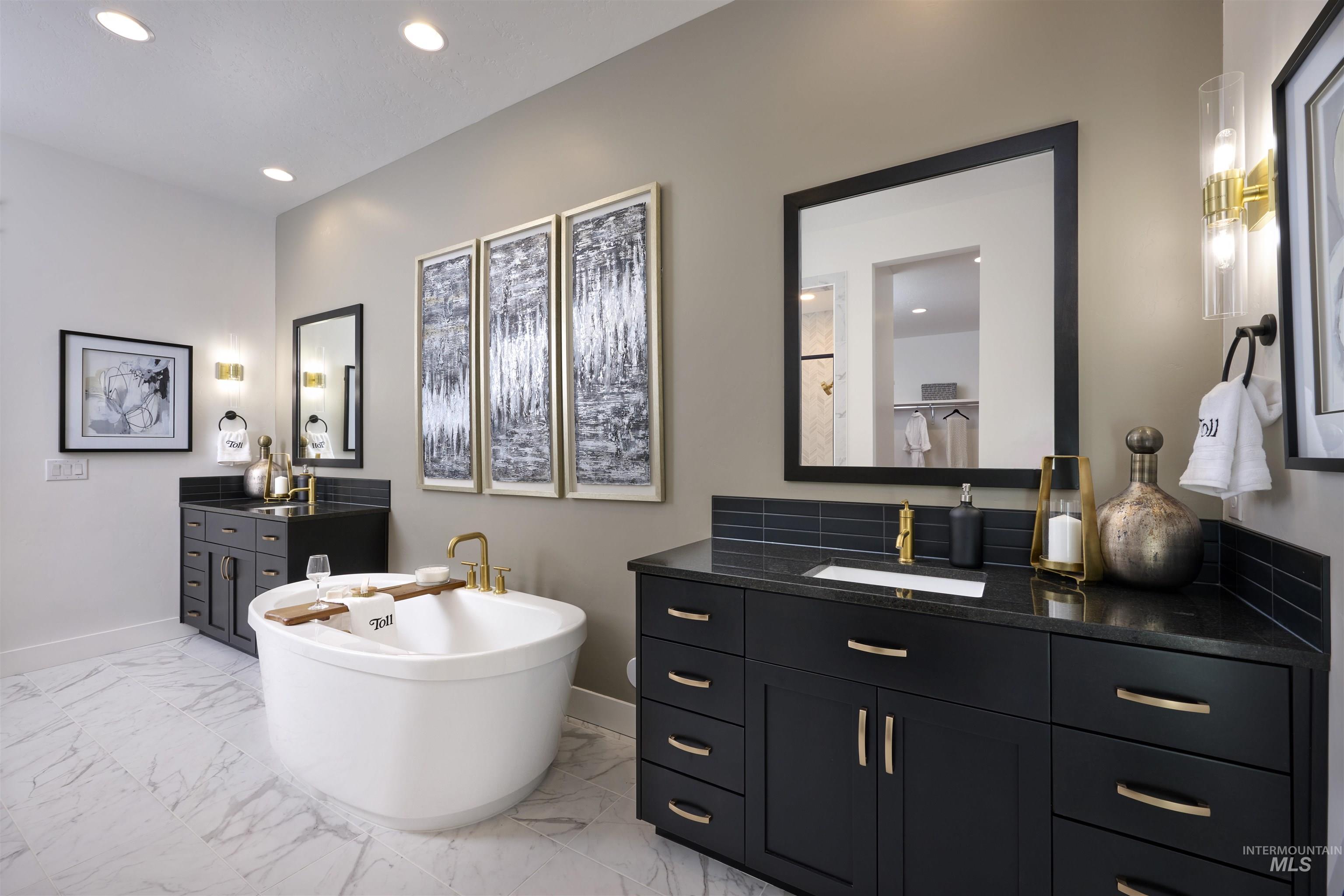 3370 North Del Sol Way Star, ID 83669 - Photo 12 of 30 Bathroom featuring a soaking tub, two vanities, light marble finish flooring, and recessed lighting