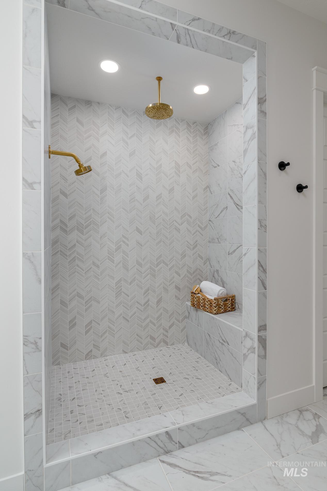 3370 North Del Sol Way Star, ID 83669 - Photo 14 of 30 Bathroom featuring tiled shower, marble finish flooring, and recessed lighting