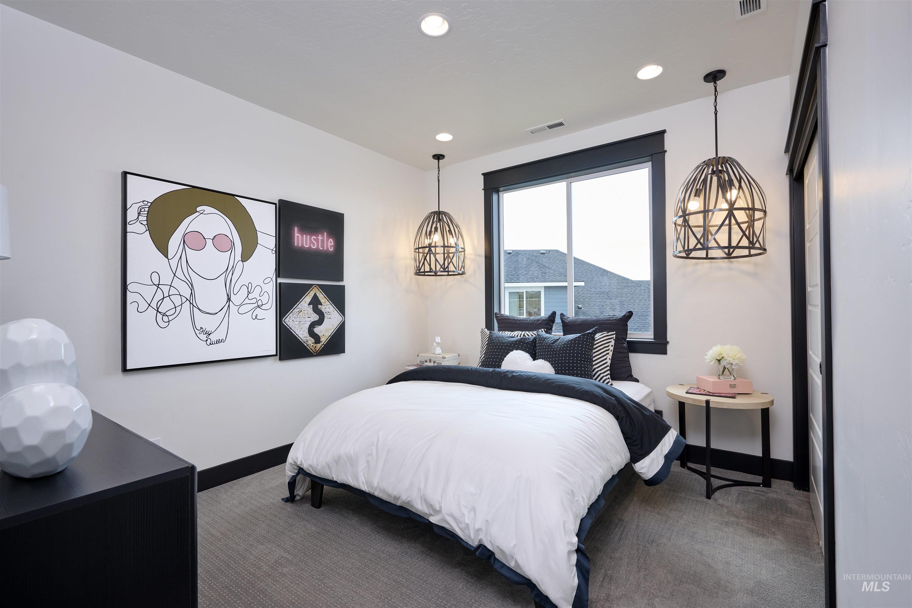 3370 North Del Sol Way Star, ID 83669 - Photo 24 of 30 Bedroom with carpet flooring and hanging lights