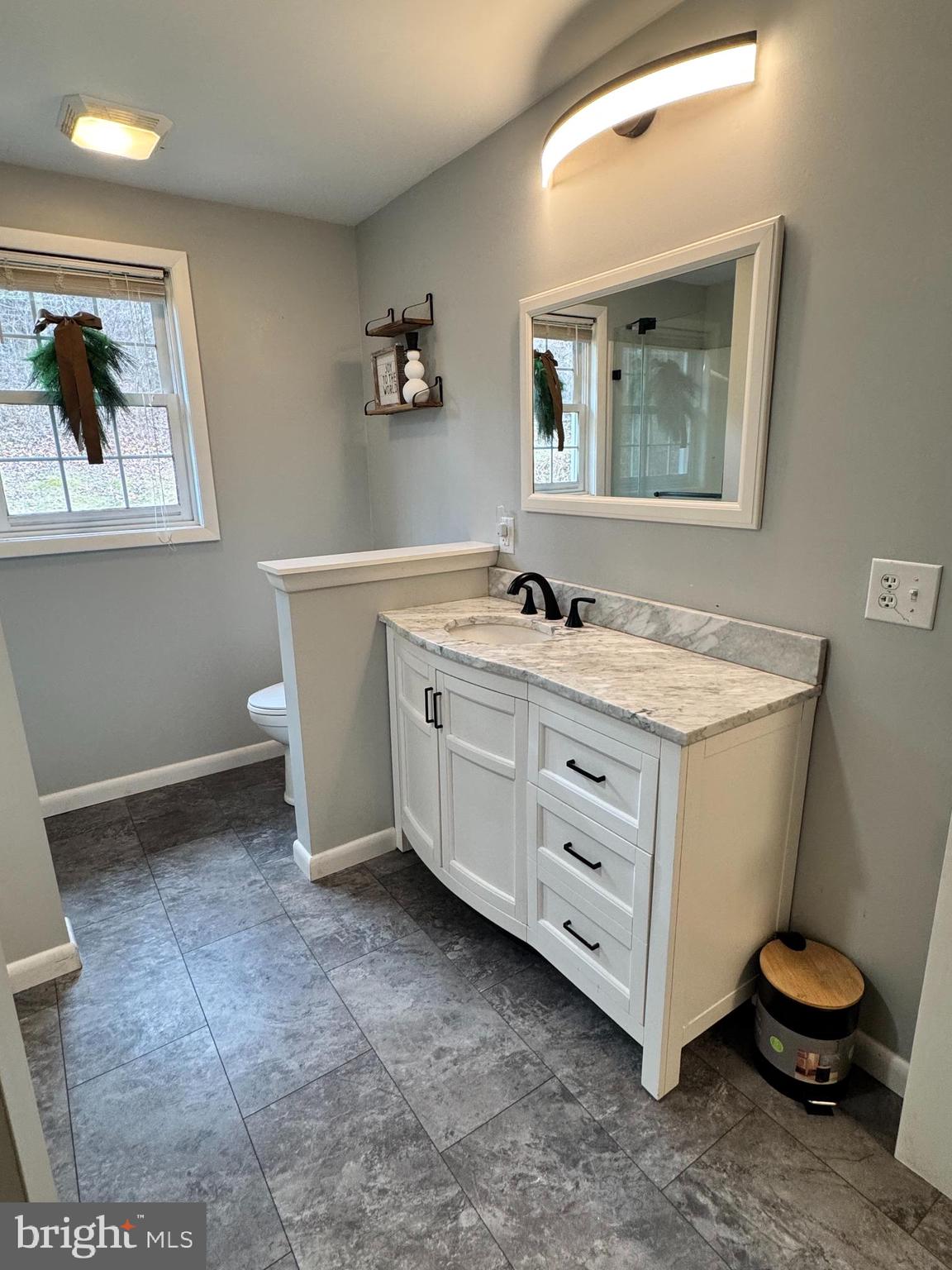 50 Irvin Road McVeytown, PA 17051 - Photo 15 of 19 a bathroom with a sink toilet and mirror