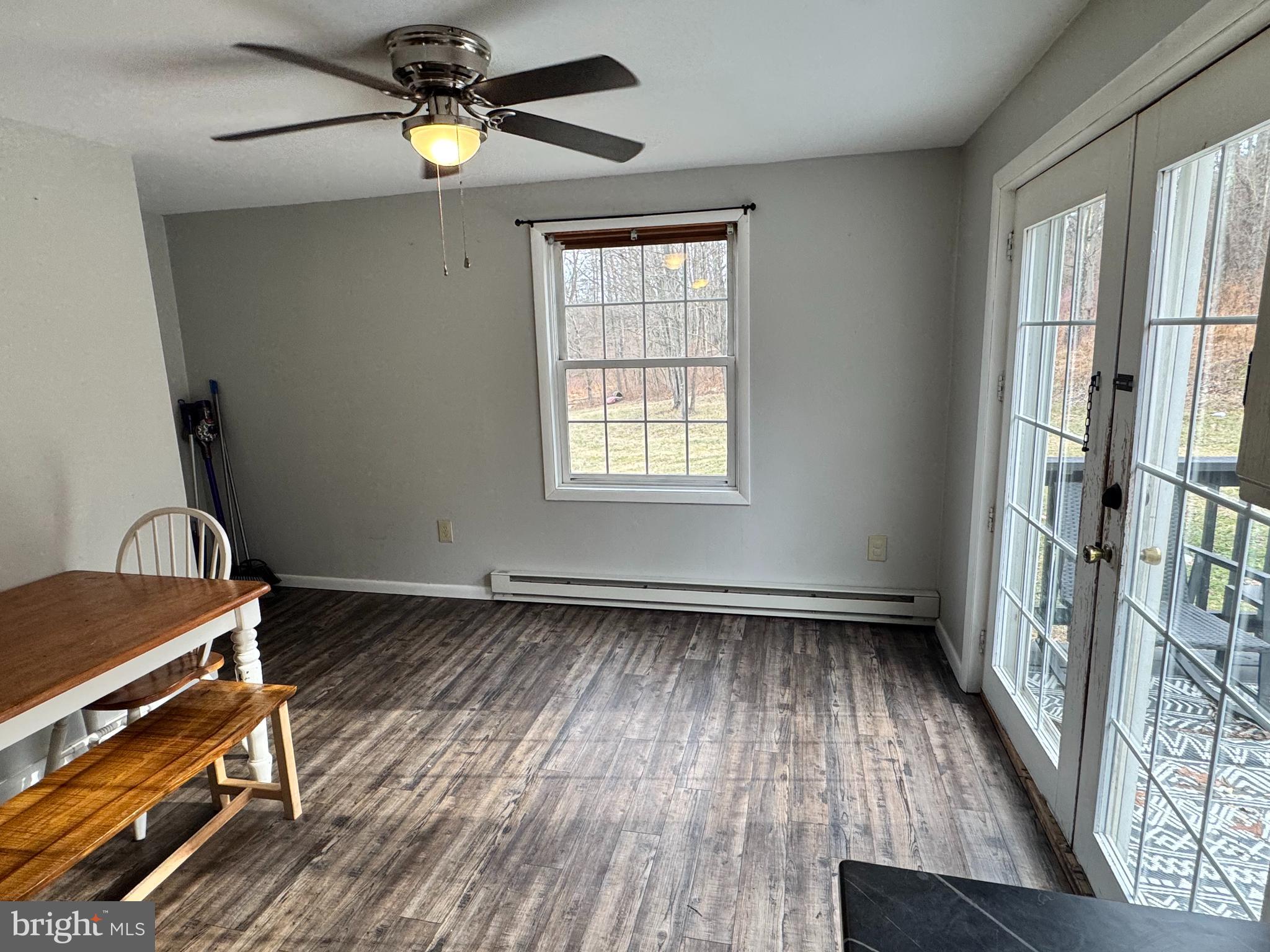 50 Irvin Road McVeytown, PA 17051 - Photo 5 of 19 a view of an empty room with window and wooden floor