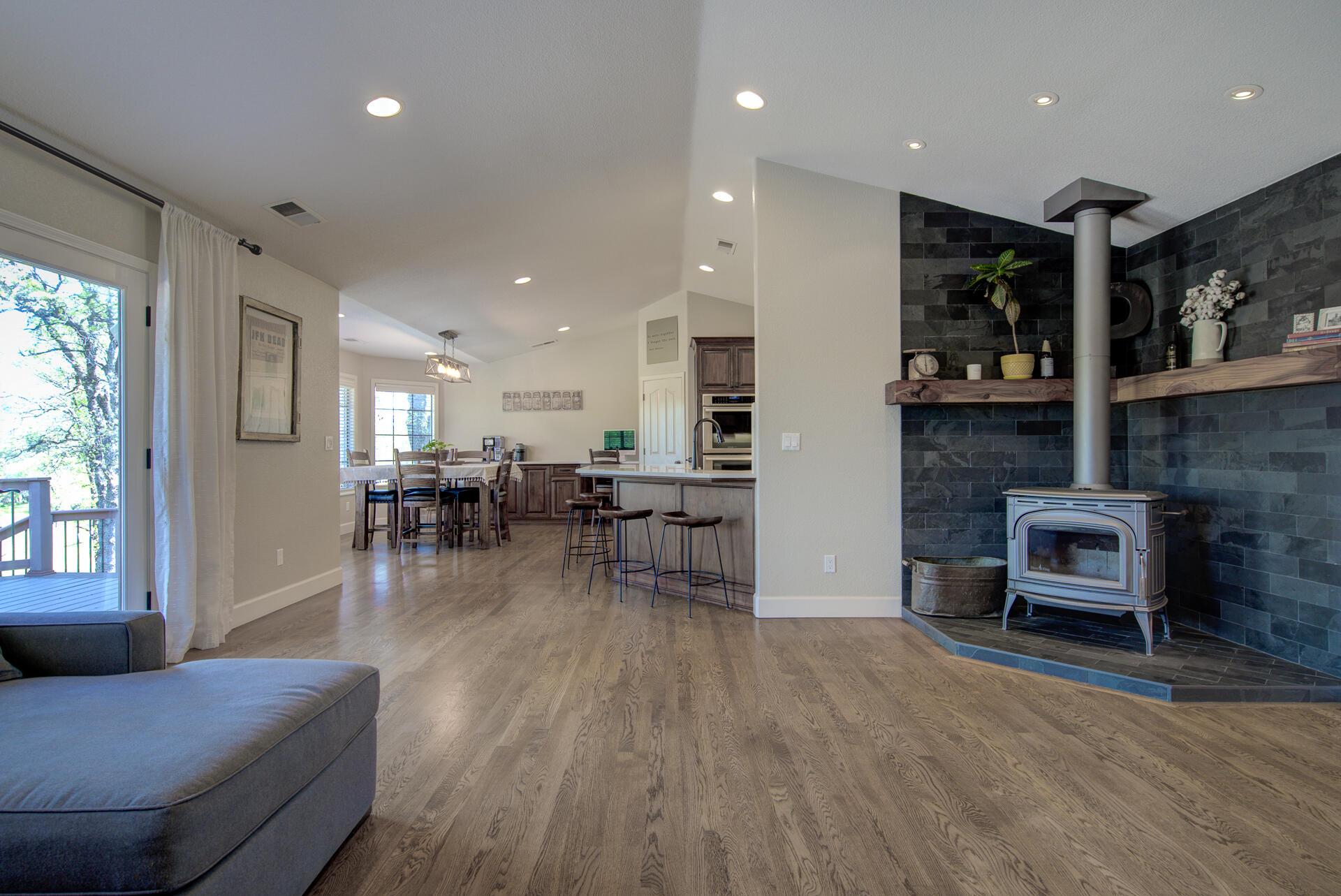 13416 Luna Drive Redding, CA 96003 - Photo 13 of 64 a living room with furniture and a fireplace