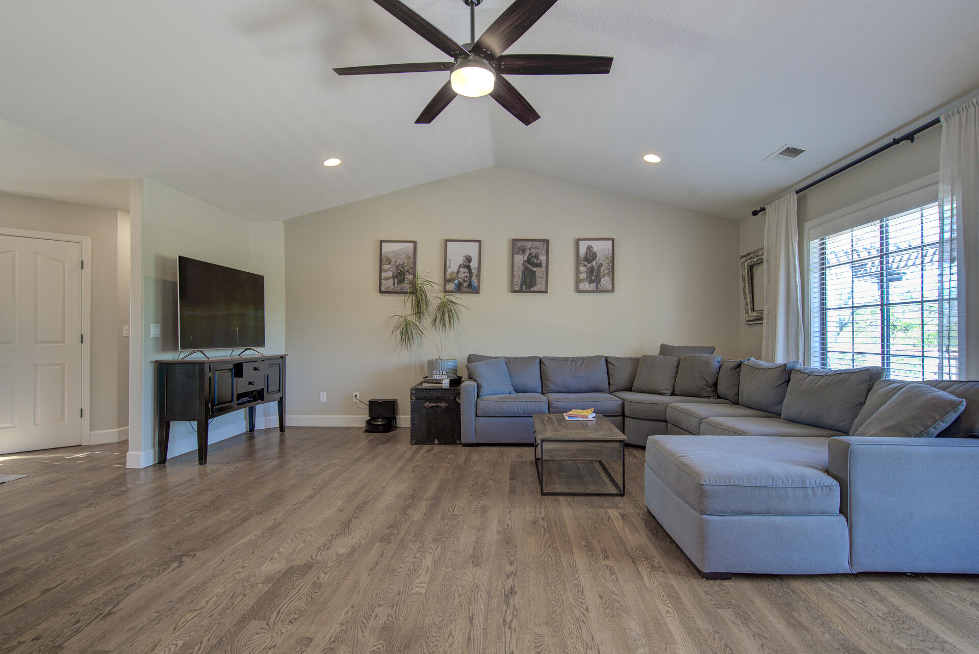 13416 Luna Drive Redding, CA 96003 - Photo 15 of 64 a living room with furniture and a flat screen tv