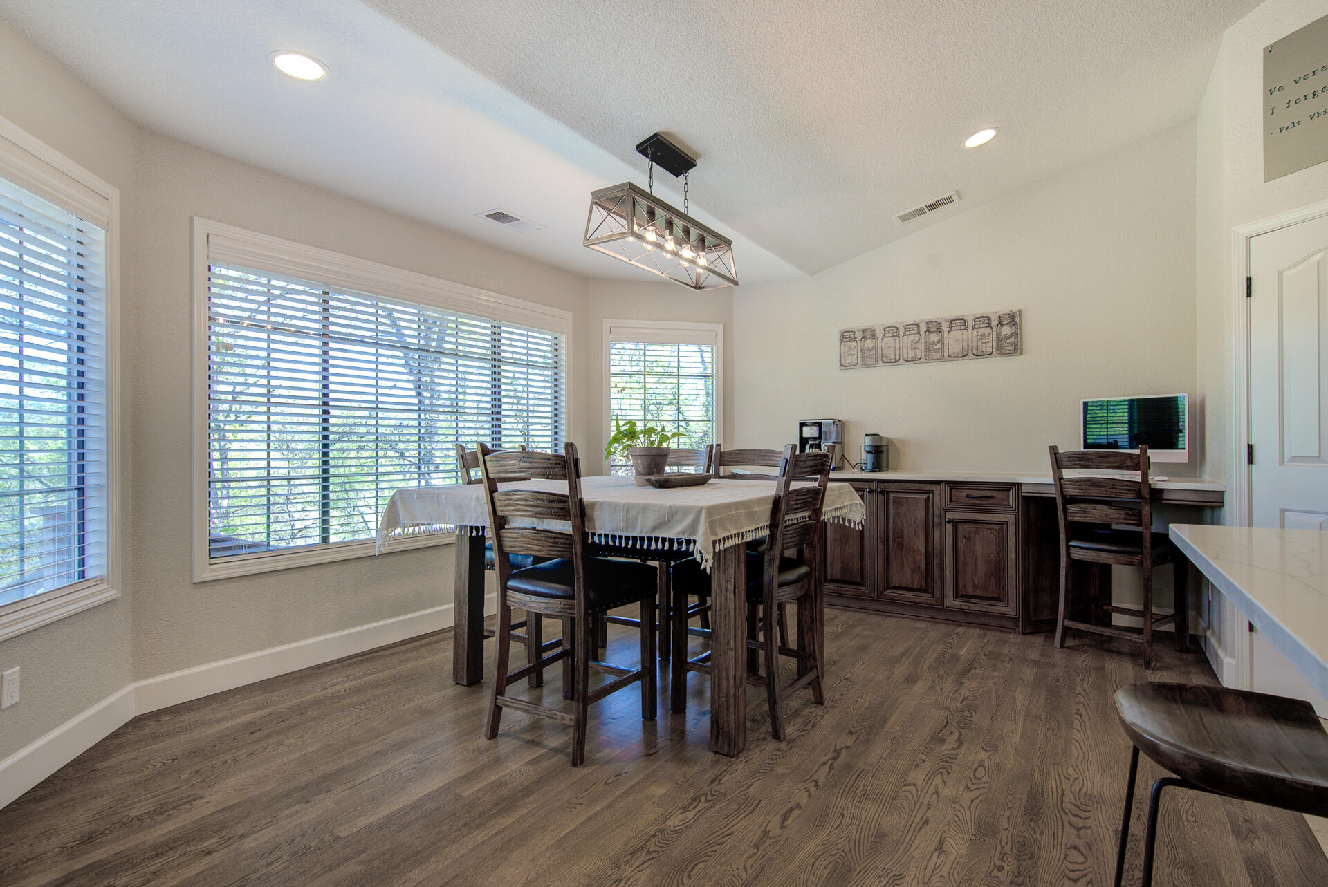 13416 Luna Drive Redding, CA 96003 - Photo 16 of 64 a view of a a dining room with furniture window and wooden floor