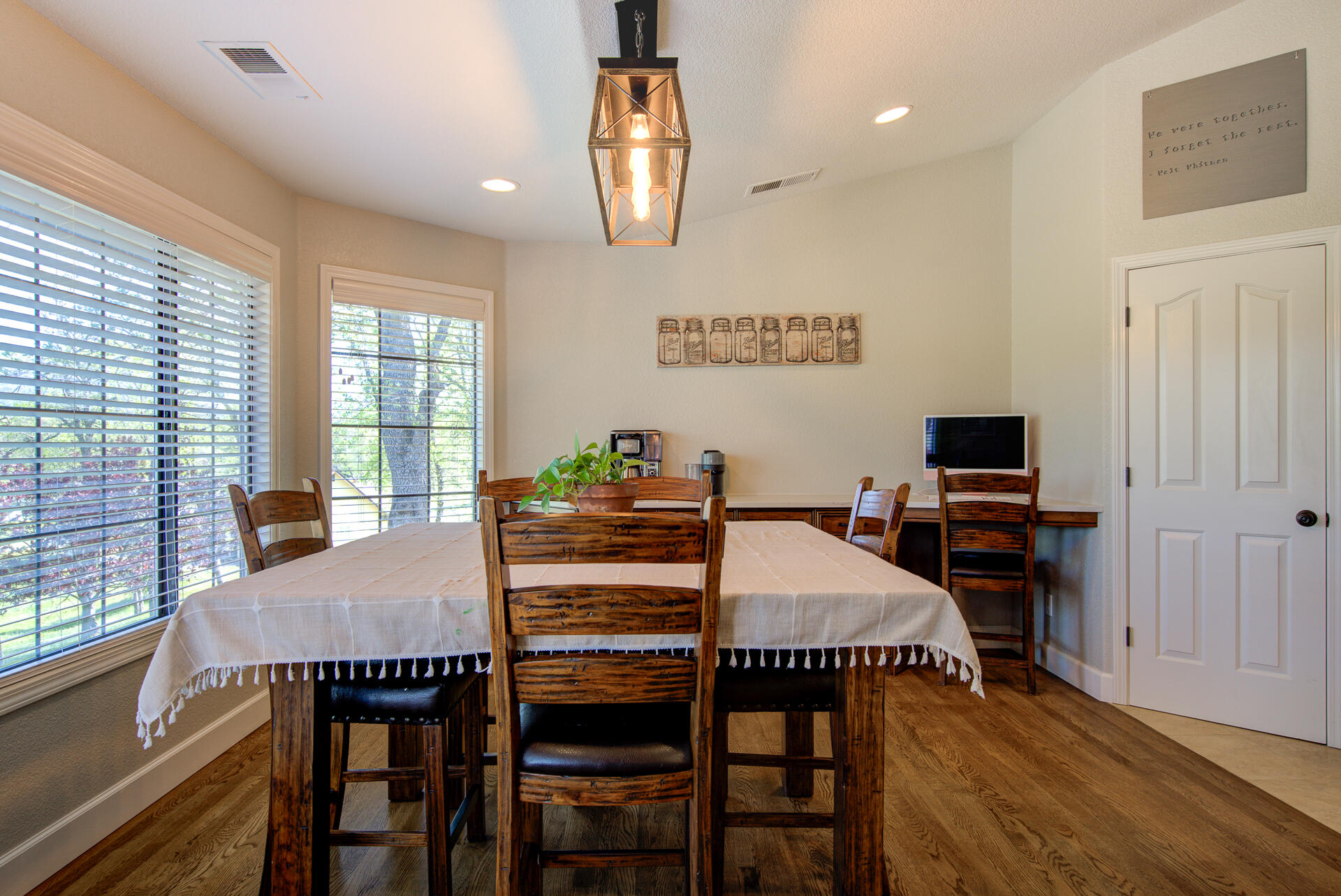 13416 Luna Drive Redding, CA 96003 - Photo 17 of 64 a view of a dining room with furniture window and wooden floor
