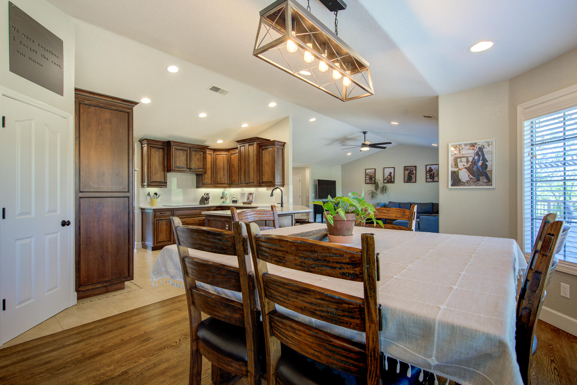13416 Luna Drive Redding, CA 96003 - Photo 20 of 64 a view of a dining room with furniture and a chandelier
