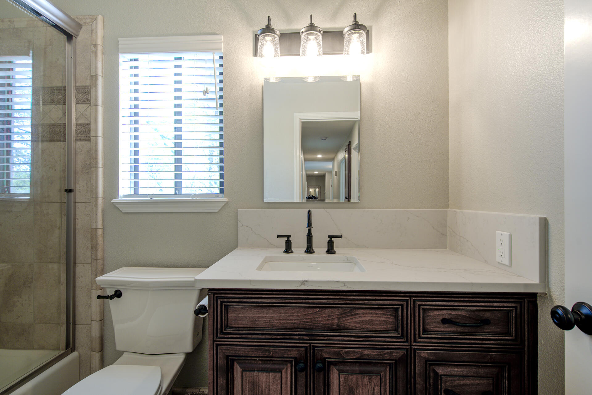 13416 Luna Drive Redding, CA 96003 - Photo 29 of 64 a bathroom with a sink and a mirror