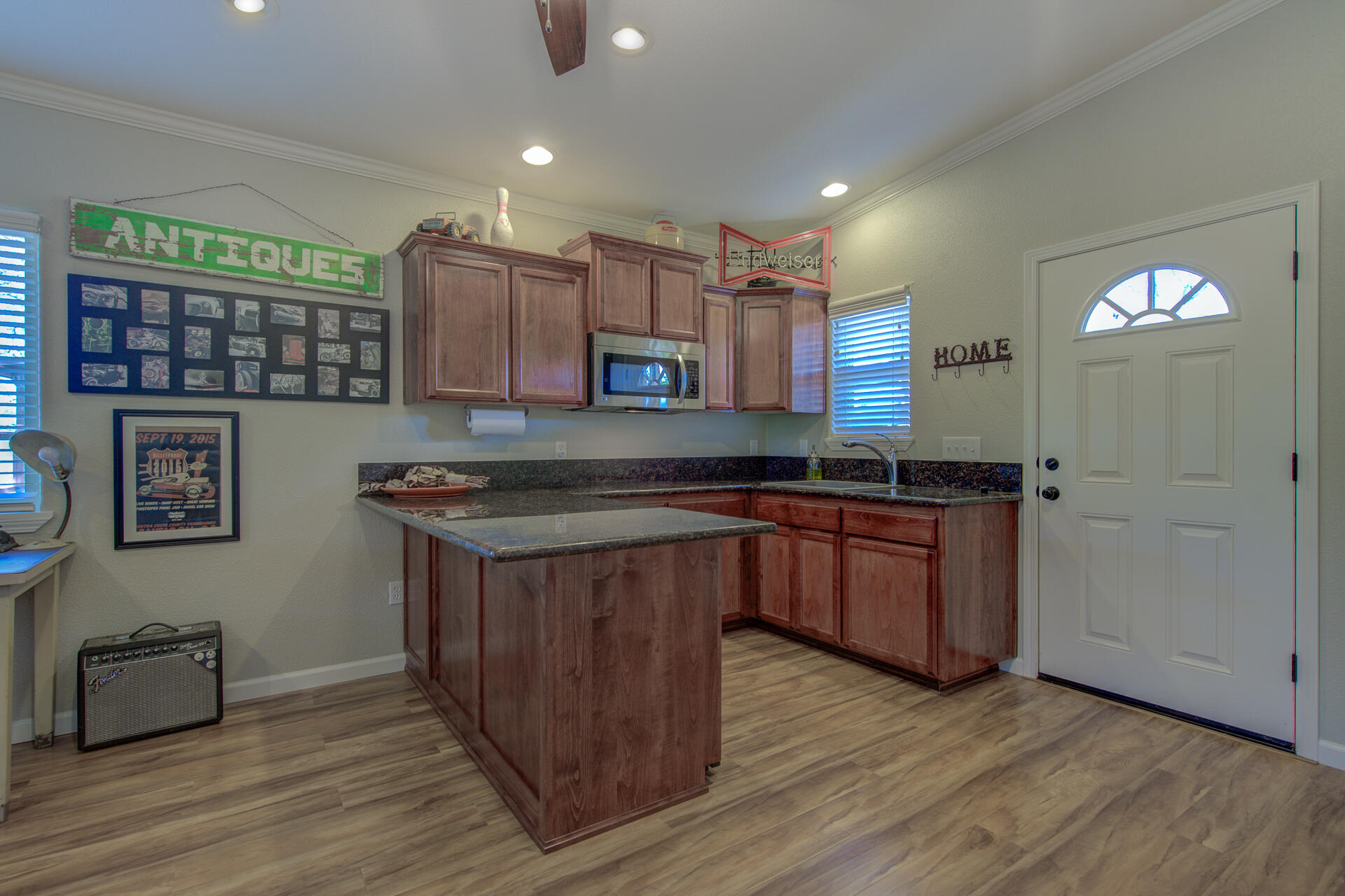 13416 Luna Drive Redding, CA 96003 - Photo 48 of 64 a kitchen with stainless steel appliances granite countertop a stove a sink and a refrigerator