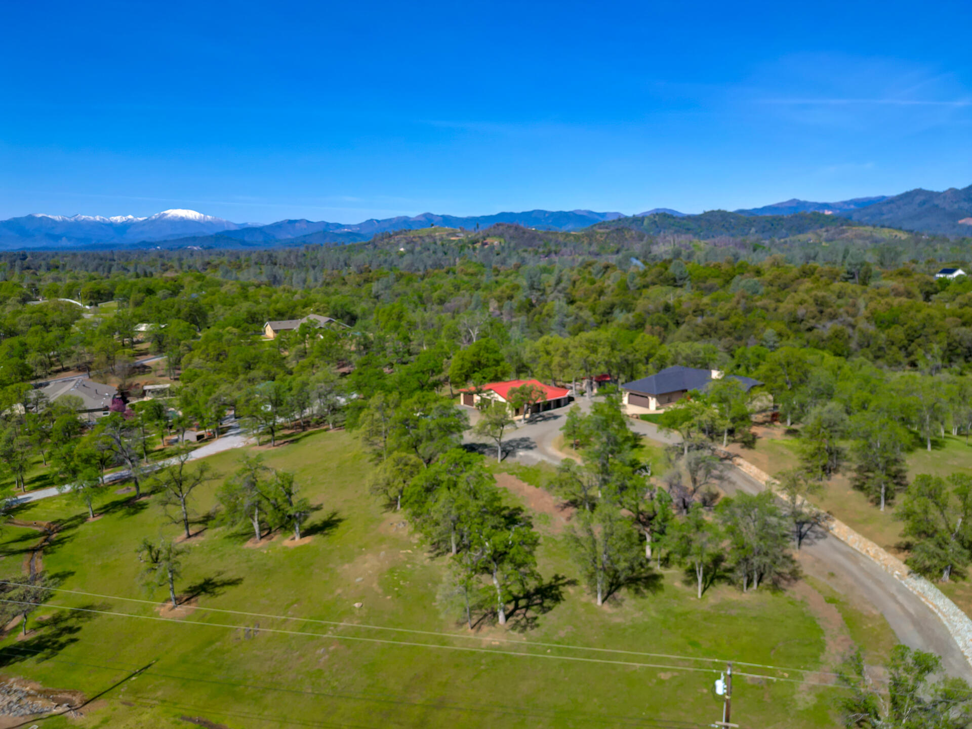 13416 Luna Drive Redding, CA 96003 - Photo 52 of 64 a view of a city with mountains in the background