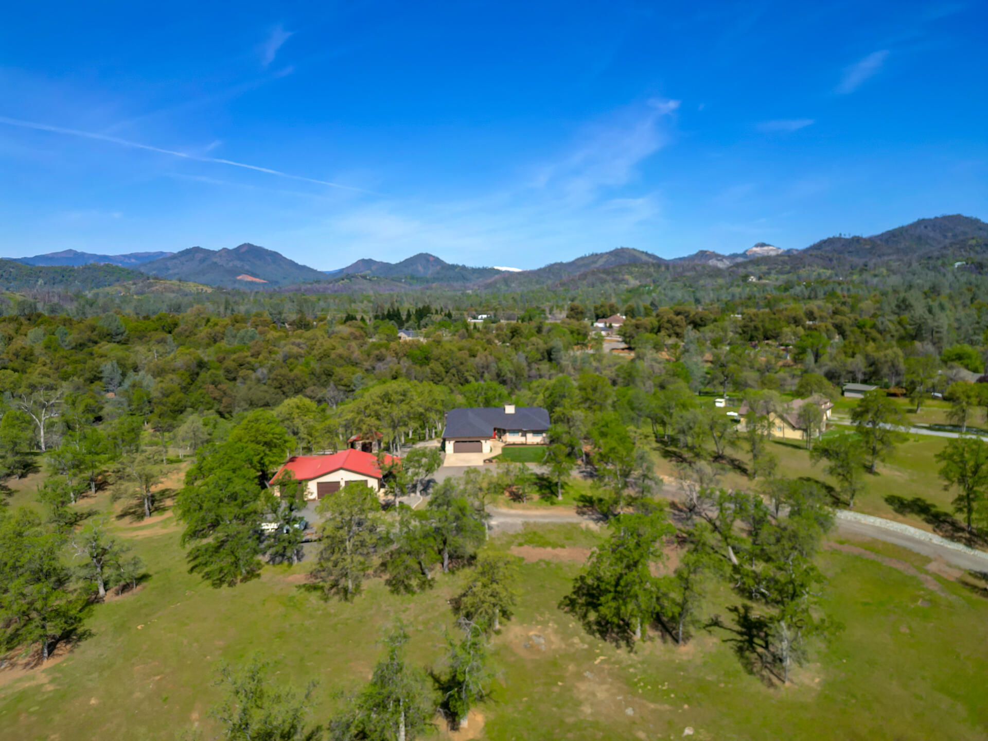 13416 Luna Drive Redding, CA 96003 - Photo 56 of 64 a view of a lake with a mountain in the background