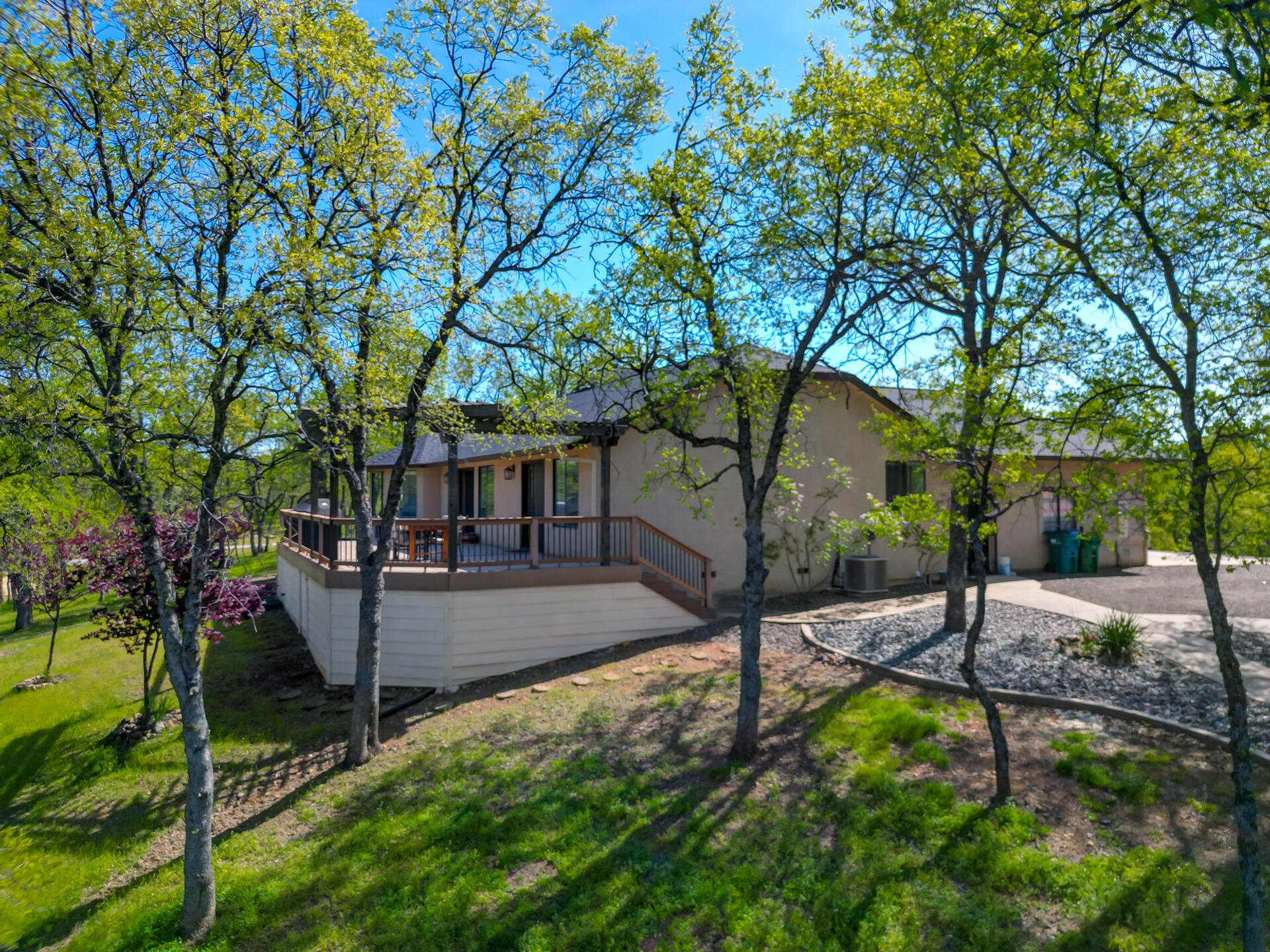 13416 Luna Drive Redding, CA 96003 - Photo 60 of 64 a view of a house with backyard and tree