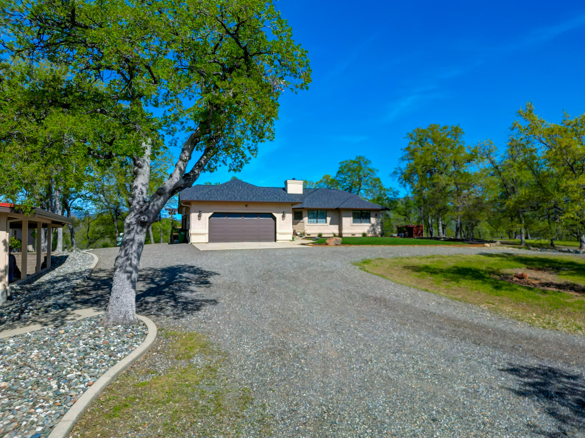 13416 Luna Drive Redding, CA 96003 - Photo 7 of 64 a view of a house with a yard