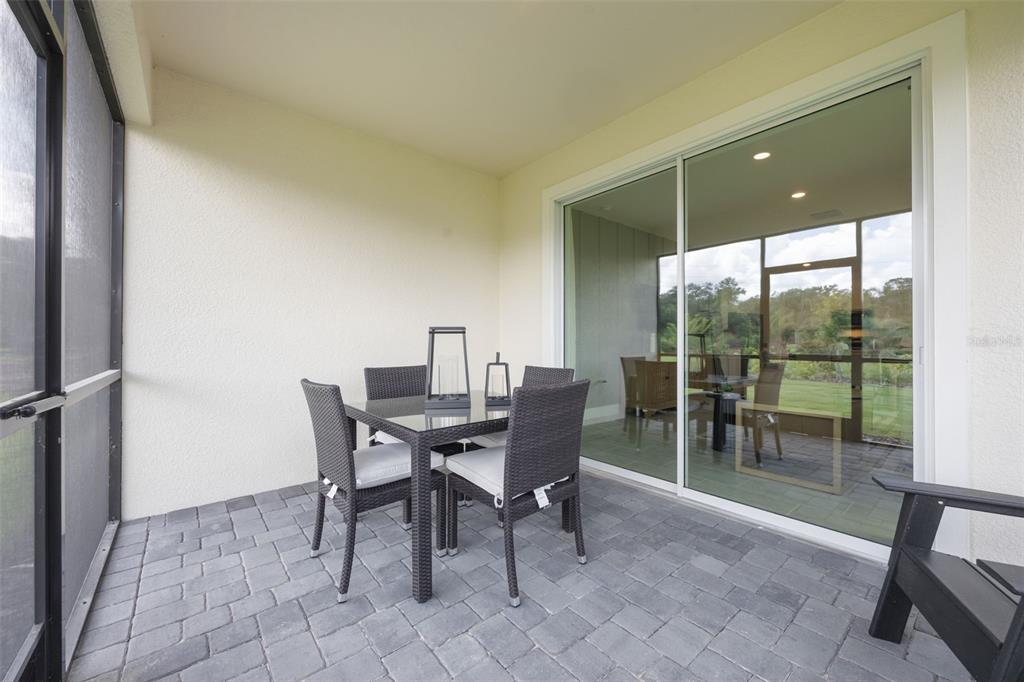3973 Kennebunk Loop Mount Dora, FL 32757 - Photo 37 of 37 a view of a dining room with furniture and window