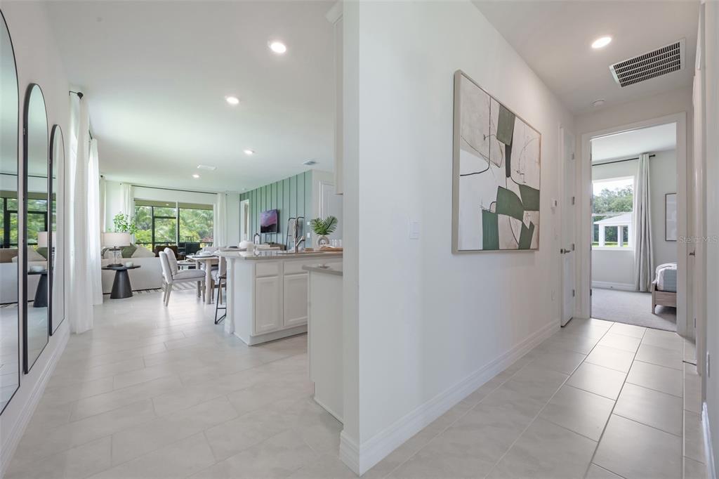 3973 Kennebunk Loop Mount Dora, FL 32757 - Photo 6 of 37 a view of a living room and dining room
