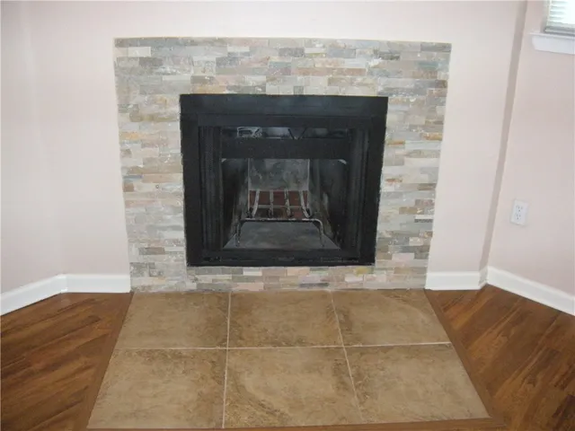 a view of fireplace and utility room