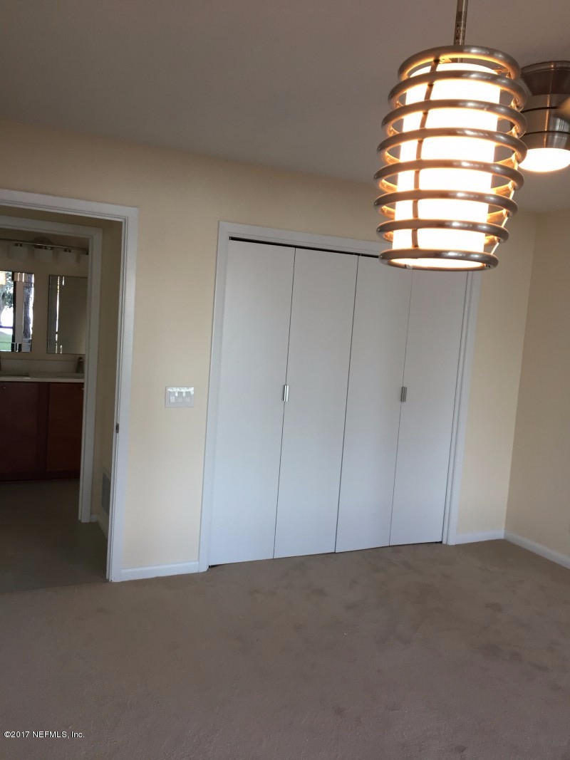 4127 Magnolia Road Orange Park, FL 32065 - Photo 16 of 24 an empty room with a empty space and a window