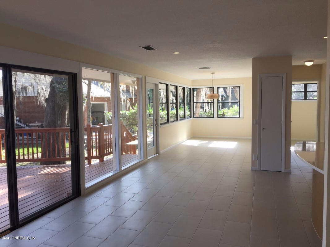 4127 Magnolia Road Orange Park, FL 32065 - Photo 3 of 24 a view of empty room with floor to ceiling window