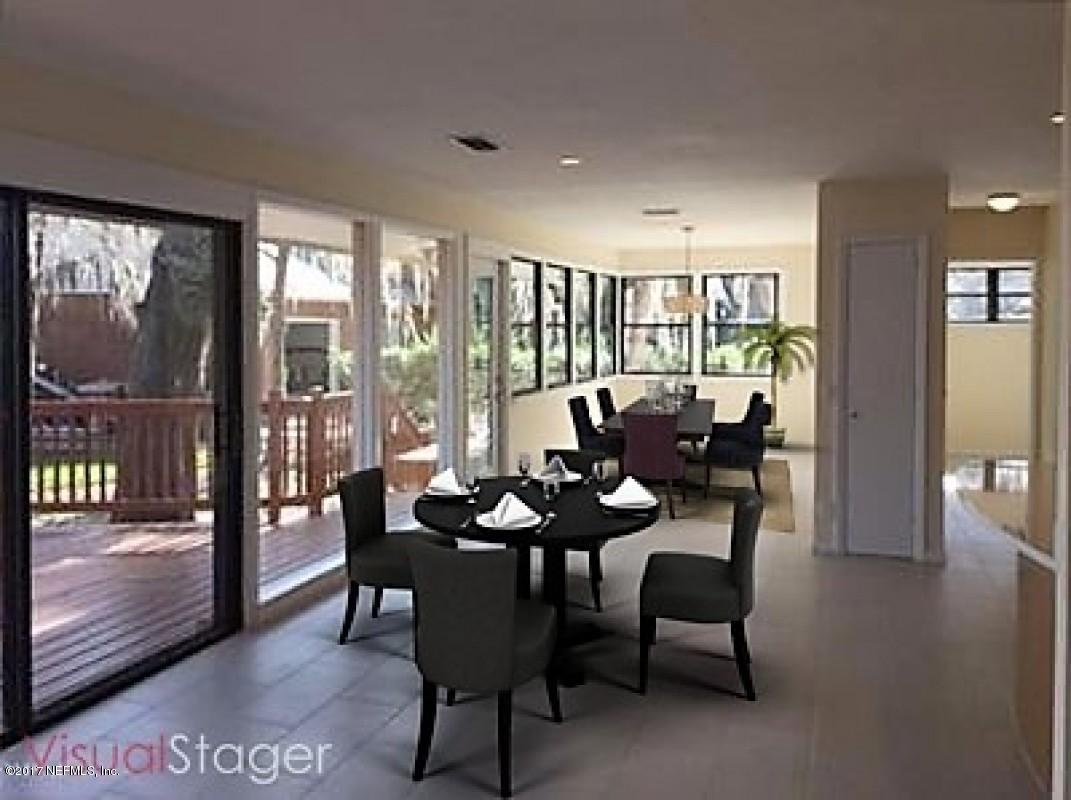4127 Magnolia Road Orange Park, FL 32065 - Photo 4 of 24 a view of a dining room with furniture window and wooden floor