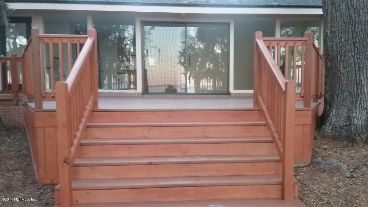 4127 Magnolia Road Orange Park, FL 32065 - Photo 8 of 24 a view of entryway with a front door