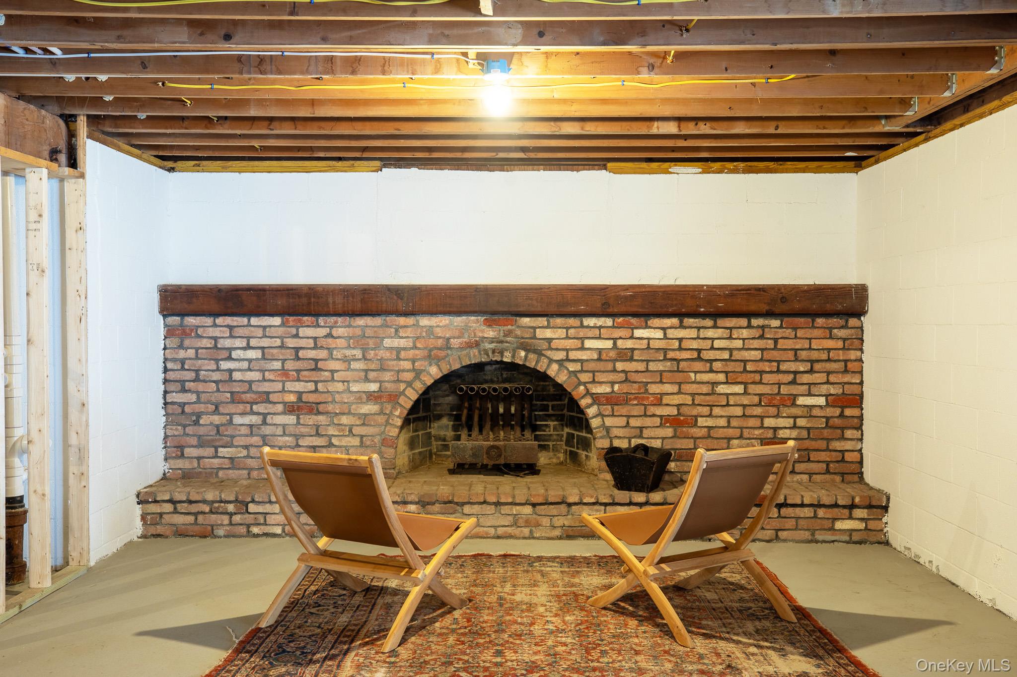 3 High Wood Road Staatsburg, NY 12580 - Photo 31 of 38 lower level - unfinished walkout basement fireplace