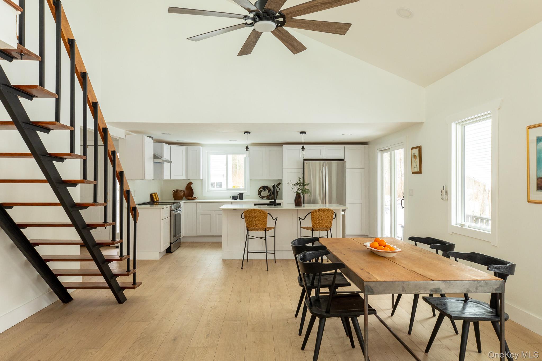 3 High Wood Road Staatsburg, NY 12580 - Photo 8 of 38 dining room table with stairs in the living room