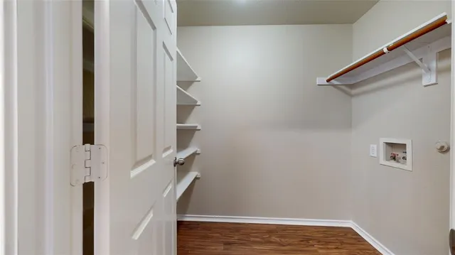a view of entryway with stairs and wooden floor
