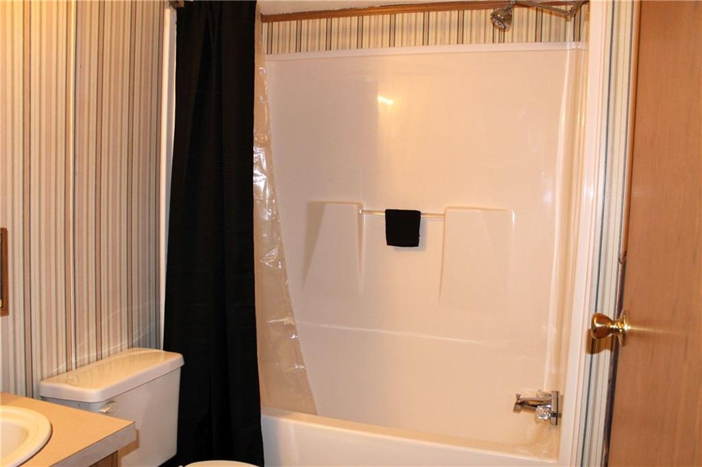 178 Stevens Pond Road Liberty, ME 04949 - Photo 19 of 24 2'nd bathroom has full tub with shower.