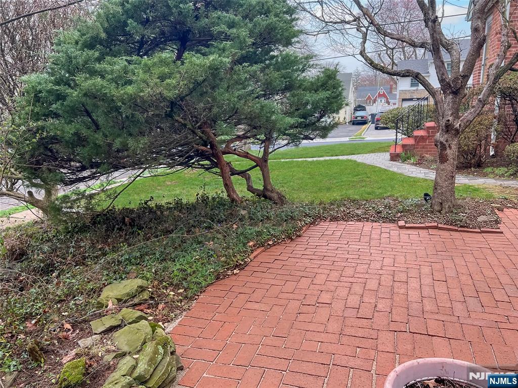 27 Jagoe Street Bergenfield, NJ 07621 - Photo 3 of 44 a view of backyard with green space