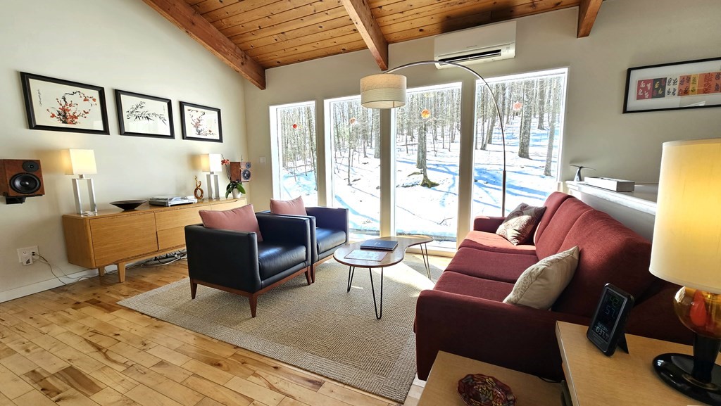 28 Butterhill Road Pelham, MA 01002 - Photo 3 of 42 a living room with furniture and a large window