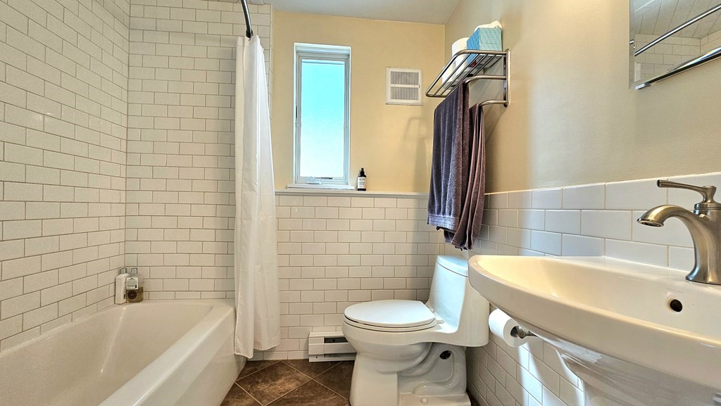28 Butterhill Road Pelham, MA 01002 - Photo 32 of 42 a bathroom with a sink a toilet and bathtub