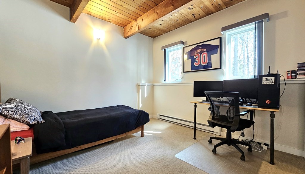 28 Butterhill Road Pelham, MA 01002 - Photo 33 of 42 a living room with furniture and a window