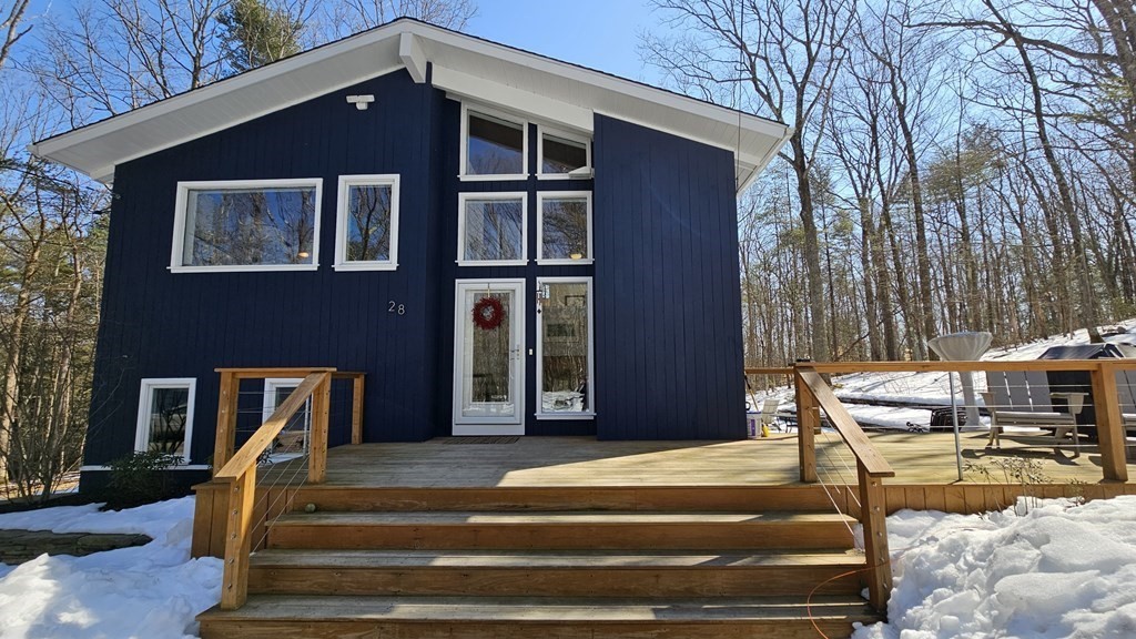 28 Butterhill Road Pelham, MA 01002 - Photo 39 of 42 a front view of a house with a yard