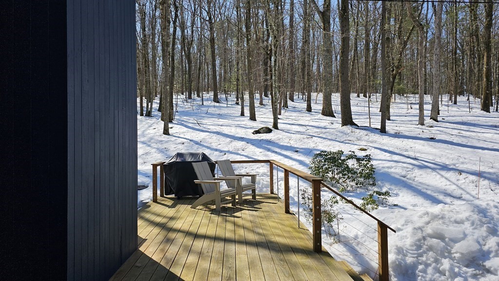 28 Butterhill Road Pelham, MA 01002 - Photo 40 of 42 a view of a balcony with chairs