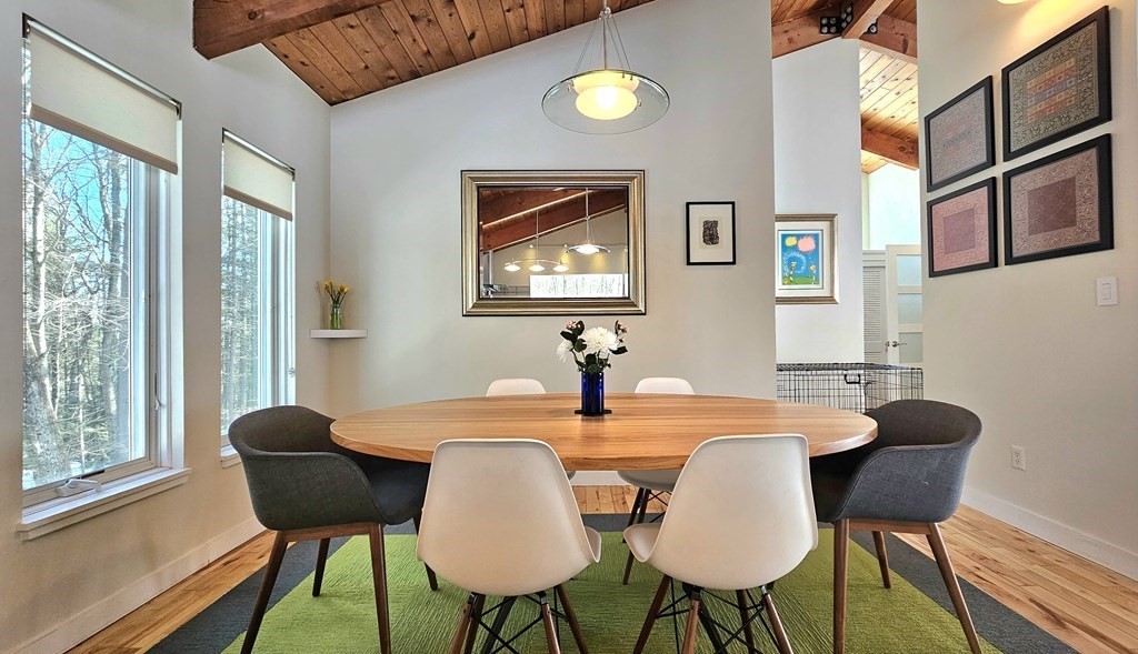 28 Butterhill Road Pelham, MA 01002 - Photo 9 of 42 a view of a dining room with furniture and wooden floor