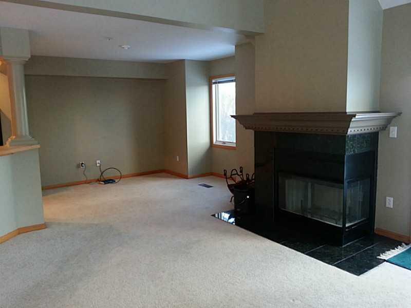 80 Tempest Road, Unit N1 Newry, ME 04261 - Photo 8 of 30 Exterior Front. wood burning fireplace