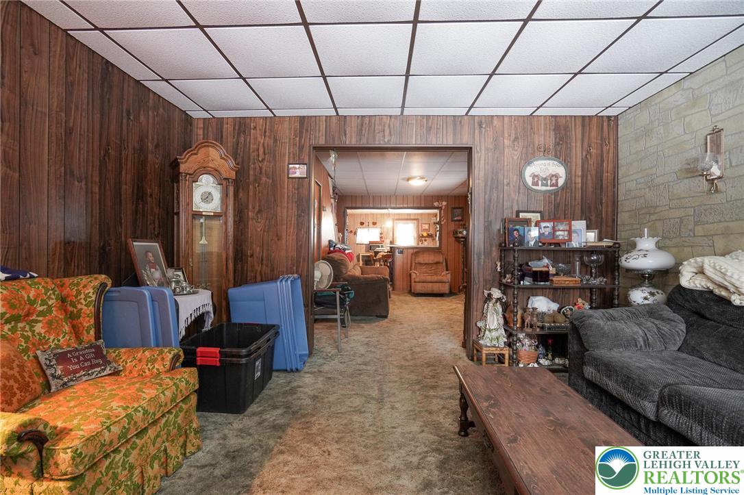 335 West Patterson Street Lansford, PA 18232 - Photo 11 of 32 a living room with furniture and a large window