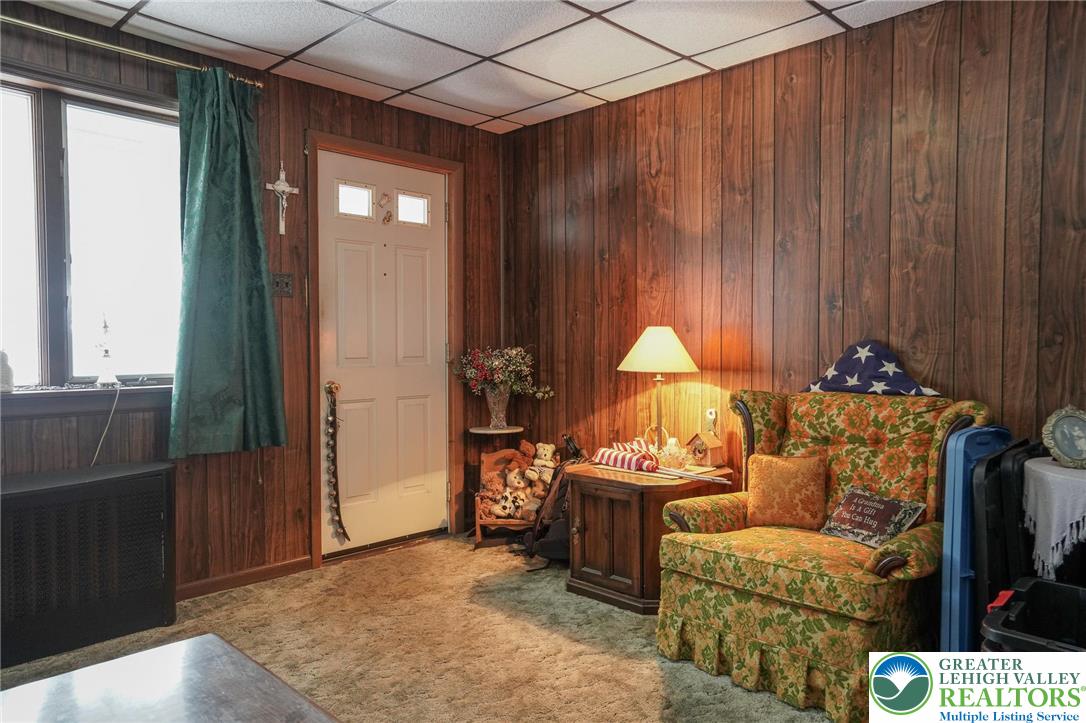335 West Patterson Street Lansford, PA 18232 - Photo 14 of 32 a living room with furniture and a window