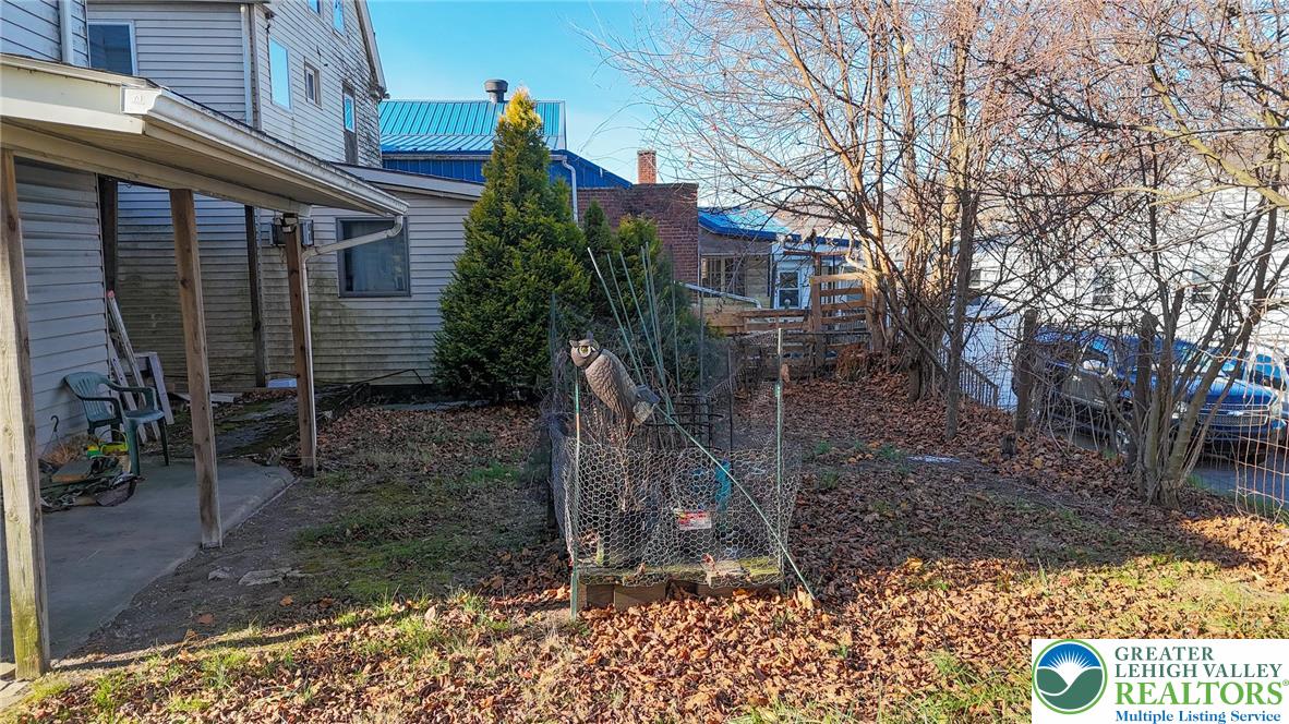 335 West Patterson Street Lansford, PA 18232 - Photo 31 of 32 a view of a house with a yard