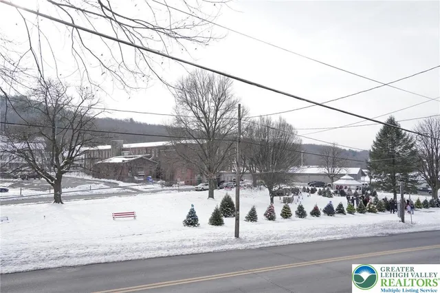 a view of a house with a street