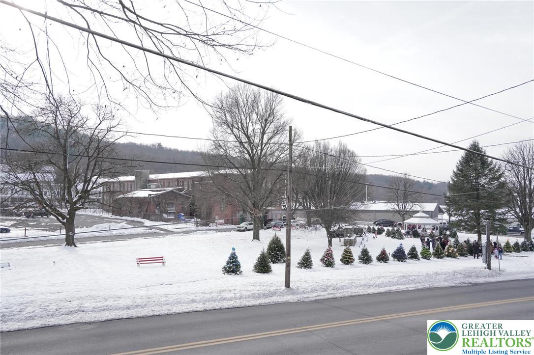 335 West Patterson Street Lansford, PA 18232 - Photo 5 of 32 a view of a road with a snow on the road