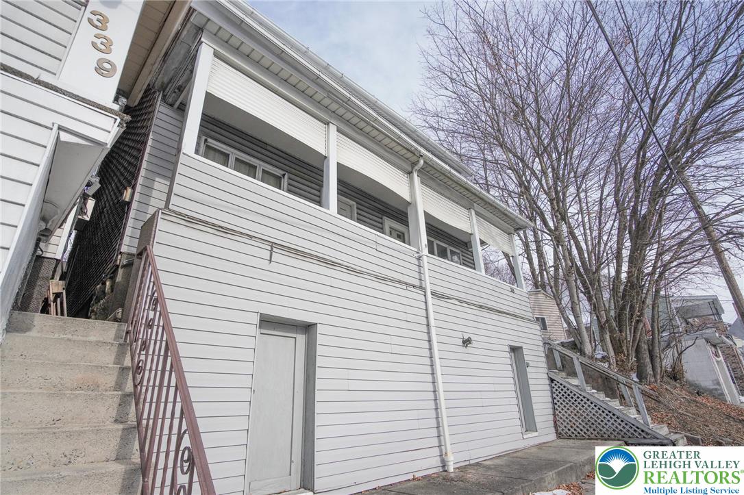 335 West Patterson Street Lansford, PA 18232 - Photo 6 of 32 a view of a house with a street