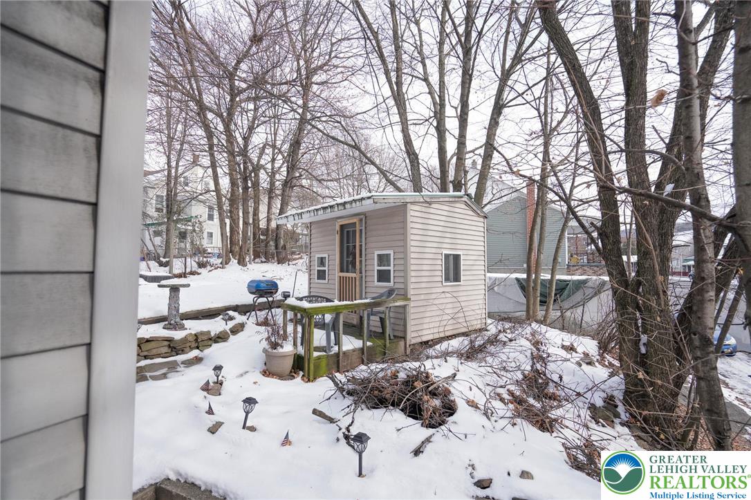 335 West Patterson Street Lansford, PA 18232 - Photo 9 of 32 a view of house with backyard and sitting area