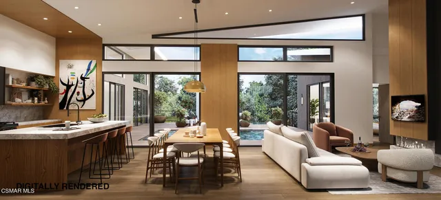 a living room with furniture and large windows