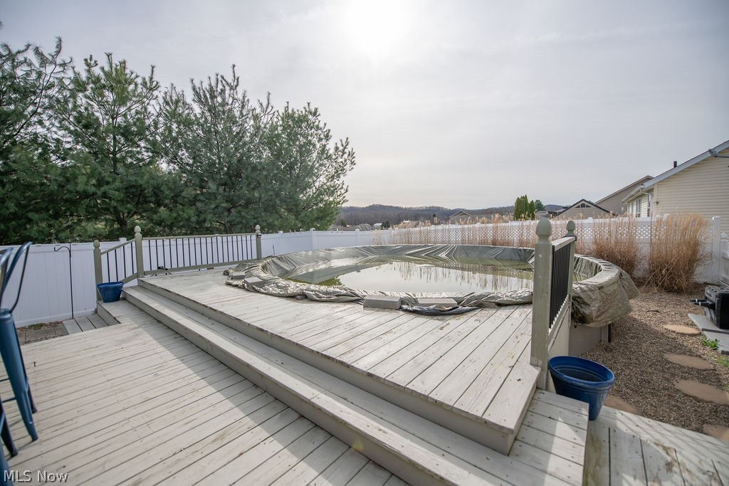316 Creekside Road Southeast New Philadelphia, OH 44663 - Photo 7 of 50 View of deck area with pool