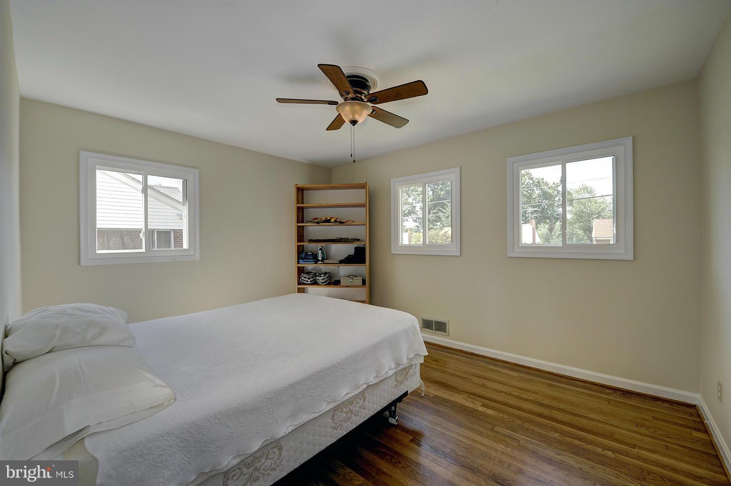 2908 Harris Avenue Silver Spring, MD 20902 - Photo 12 of 30 a bedroom with a bed and a window