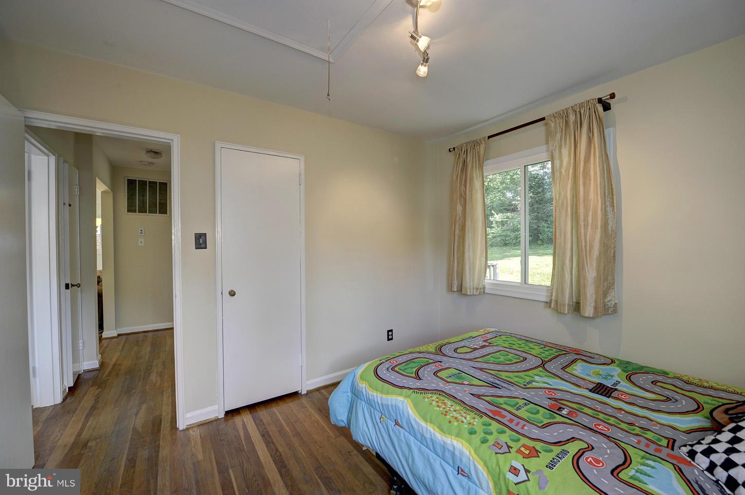 2908 Harris Avenue Silver Spring, MD 20902 - Photo 14 of 30 a bedroom with a bed and a window